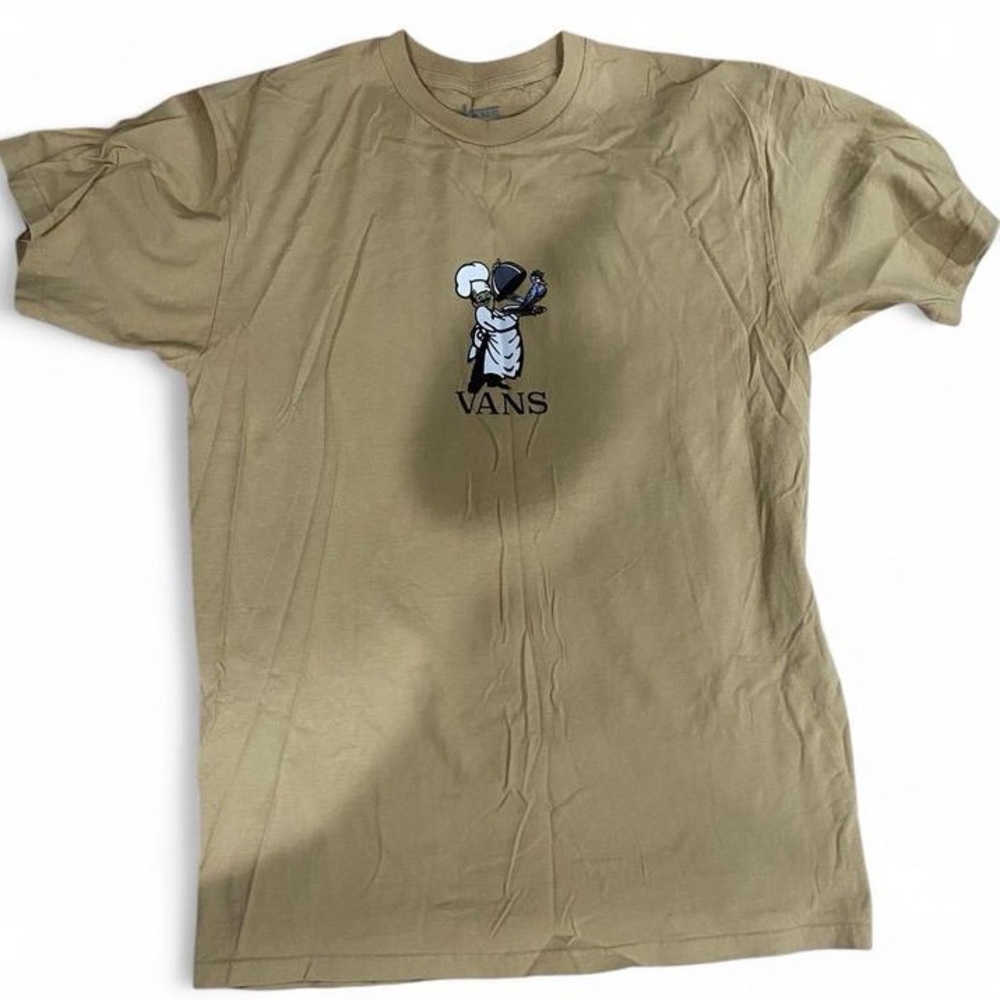 Tan Vans graphic tee with chef and bird design